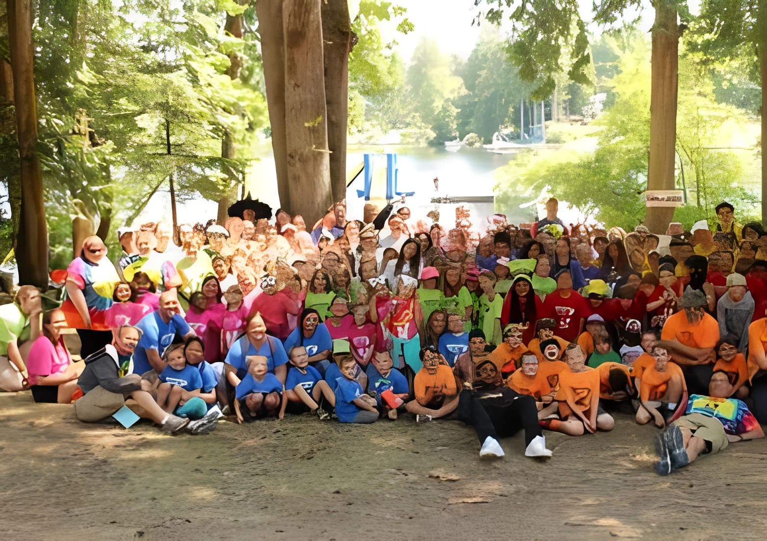 Group photo at summer camp by lake
